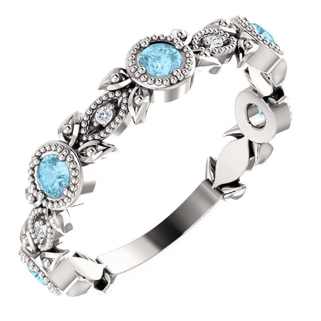 ladies rings magazine-14KT GOLD 0.30 CTW AQUAMARINE & 0.03 CTW DIAMOND LEAF RING