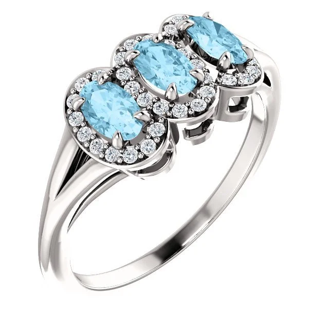 ladies rings social media-14KT GOLD .60 CTW AQUAMARINE & .16 CTW DIAMOND 3 STONE HALO RING